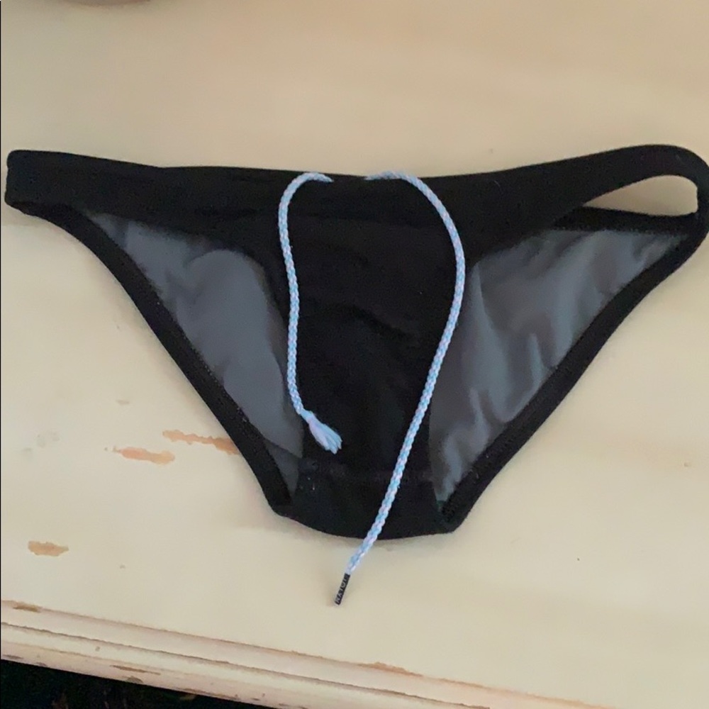 Jolyn black swim bottoms with draw string.